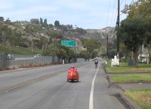 My attempt at drafting the red Fraser velomobile was twarted by my sluggish 'put-away-the-camera' time.
