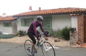 Angela, dwarfing by the Munchkin House.